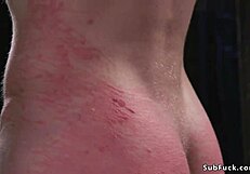 Muscled black mistress whips male slave