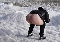 Watch This Milf Pissing In The Sea With Her Hairy Pussy!