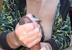 she strokes his huge cock until he cums