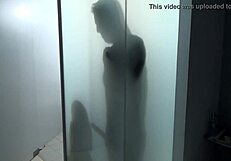 the blonde teen bathes in the shower, giving blowjob and licking