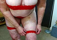 thick dawnskye1962 stretches in red lace lingerie