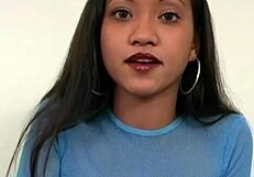 The dark-haired prostitute enjoys her big tits.