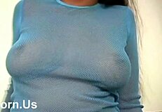 The dark-haired prostitute enjoys her big tits.