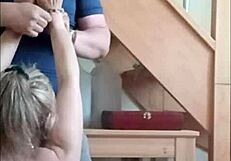 Bound slave endures ice and blowjob