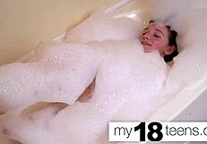 Babe intensely masturbates in bath, explosive orgasm closeup