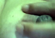 Asian Elderly Woman Showcasing Her Large Breasts