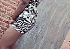 Watch this ebony stripper twerk her booty in a sexy dress at the club,