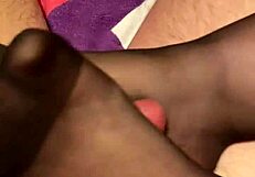 giving hubby a footjob in black toe stockings 😍