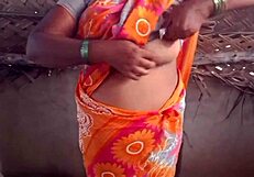 housewife with big boobs shows off in village house