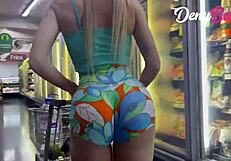 Blonde slut teases in market with tiny shorts, hiding her wild side