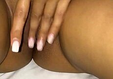 Girl getting wet in oiled shaved pussy