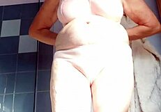 Oma plays and uses cucumber in hairy pussy