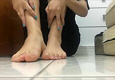 Black socks come off, revealing spit-covered feet