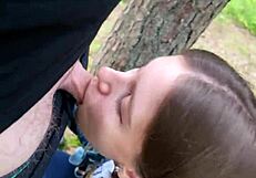 Petite brunette deepthroats and swallows cum outdoors after home fuck