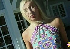 A blonde plugs her girlfriend's pussy and teases her asshole outdoors