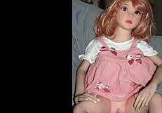 camille the sex doll is modeling in a pink outfit for the photoshoot