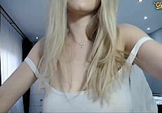 who is she doing sloppy masturbation on web chat, spitting and moaning loudly?