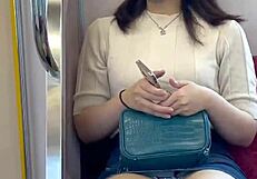 Chinese woman in skirt exposes panties during upskirt on crowded train