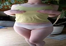 Fit girl with round ass models many panties in striptease!