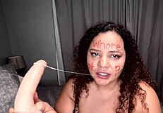 BBW girl deepthroats dildo after writing dirty words on her face!