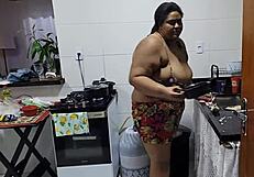 Chubby stepmother with big tits fucked by stepson in kitchen