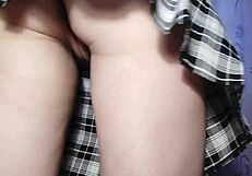 Amateur babe in a short skirt dances seductively on camera, then masturbates her shaved pink pussy to a real solo orgasm