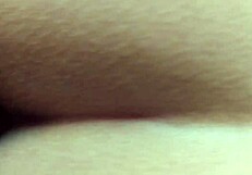 Morenita displays her tight shaved vagina in close-up view