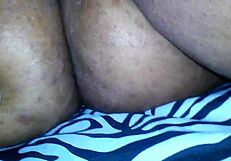 Sexy ebony BBW playing with her hairy pussy with a vibrator.