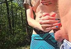 Wife gives quick handjob during outdoor walk