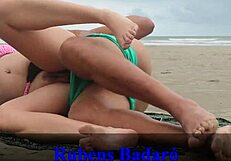 Hey, this couple disguises as bathers and fucks wildly on the beach sand