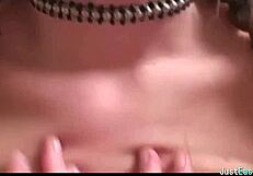 pigtailed brunette plays with big tits