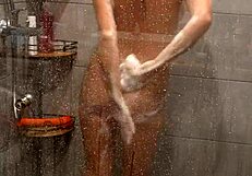 hot milf has multiple magic wand orgasms in shower
