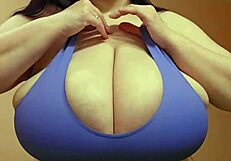 Feeling the weight of huge tits