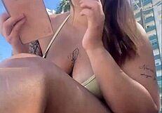 African woman feels excitement flashing on beach