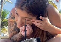 African woman feels excitement flashing on beach