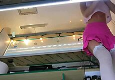 the boss chats with his shop assistant while she talks to the customer