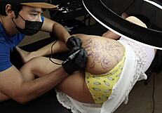 Big Ass Girl Seduces Tattoo Artist