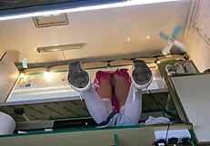 the boss chats with his shop assistant while she talks to the customer