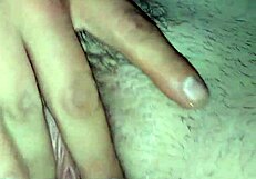 Amateur wife receives a cameltoe massage from her husband.