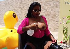Hey, watch Maxine X plunge that huge sex toy deep in the pool with her Asian curves on full display