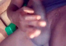 the african shemale begins her solo masturbation, stroking her huge monster cock until a big cumshot explodes in close-up