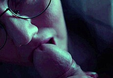 A prurient woman passionately sucks her paramour's cock, gagging and swallowing deeply in a sloppy homemade blowjob.