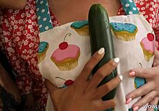 tiffany watson and jada kai explore kinky lesbian sex with a cucumber in the kitchen.