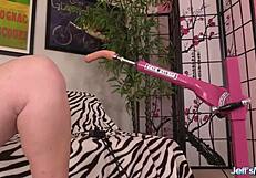 Does fat redhead Ginger Rose take a machine mounted dildo?