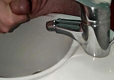 I stroke my shaved cock, get excited, and cum.