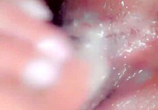 The creamy wetness coats her slutty ass and pussy in this steamy encounter.