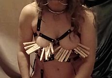 Slave in leather harness spreads mouth for self-session