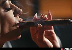 horny milf with huge tits feels intense pleasure masturbating and giving blowjob while smoking a 9 inch cigar