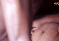 the slut lies in missionary position. her big pussy gets licked and fucked by a monster cock.