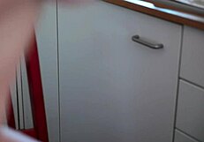 Beauty in the kitchen masturbates pussy